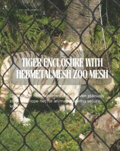 Close-up of Hebmetalmesh handwoven stainless steel wire rope net for animals showing secure knots.