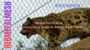 Close-up view of a snow leopard viewed through a secure, professional hand-knotted stainless steel rope mesh fence, demonstrating the strength of high-tensile wire for zoo and residential enclosures.